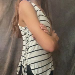 Striped tank top with criss cross strings on hips